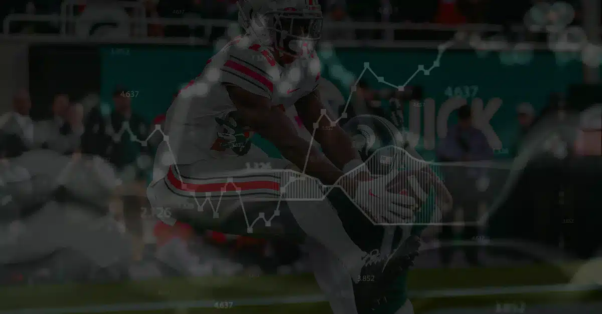 Football player making a contested catch with overlaid data charts and numbers, symbolizing real-time sports betting insights and loyalty-linked moment triggers.